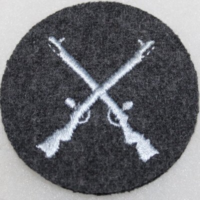 Insigne de spécialité armurier