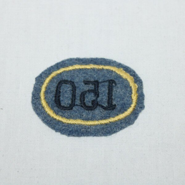 Insigne 150ri jaune