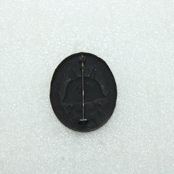 Badge blessé Noir