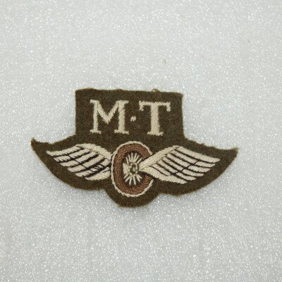 Badge M.T