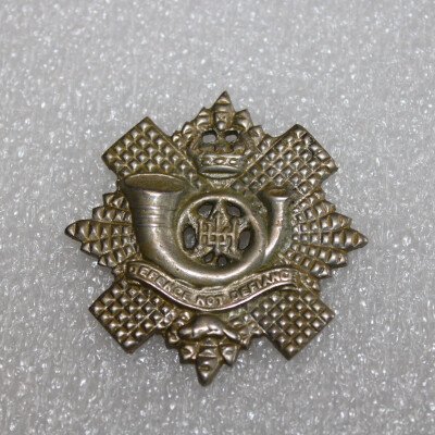 cap badge du Highlands  light Infantery .