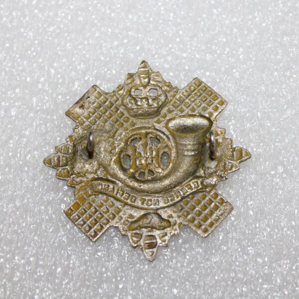 cap badge du Highlands  light Infantery .